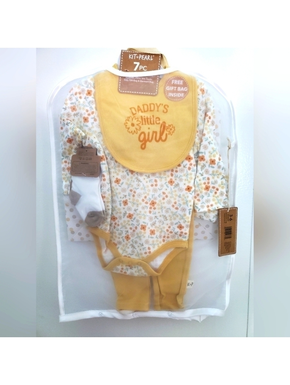 Kit+Pearl 7-Piece Baby Outfit Set for 3-6 Months with Bib, Socks, Pants, and Cap